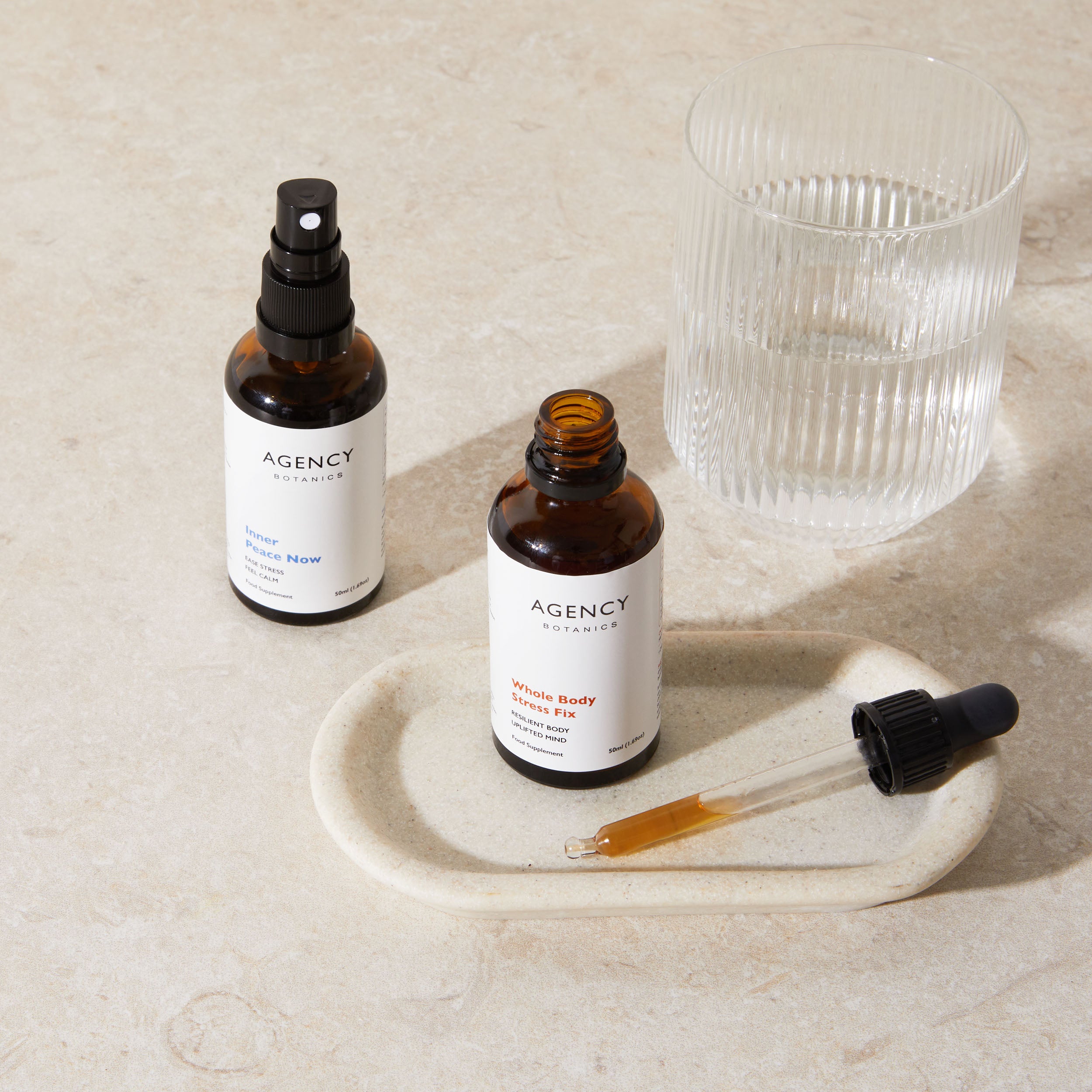 Assortment of organic herbal tinctures and supplements from Agency Botanics for stress, anxiety, and energy,that are made with adaptogens including Ashwagandha, Siberian Ginseng, Schisandra, Cordyceps and nootropics like lemon balm and Holy basil.